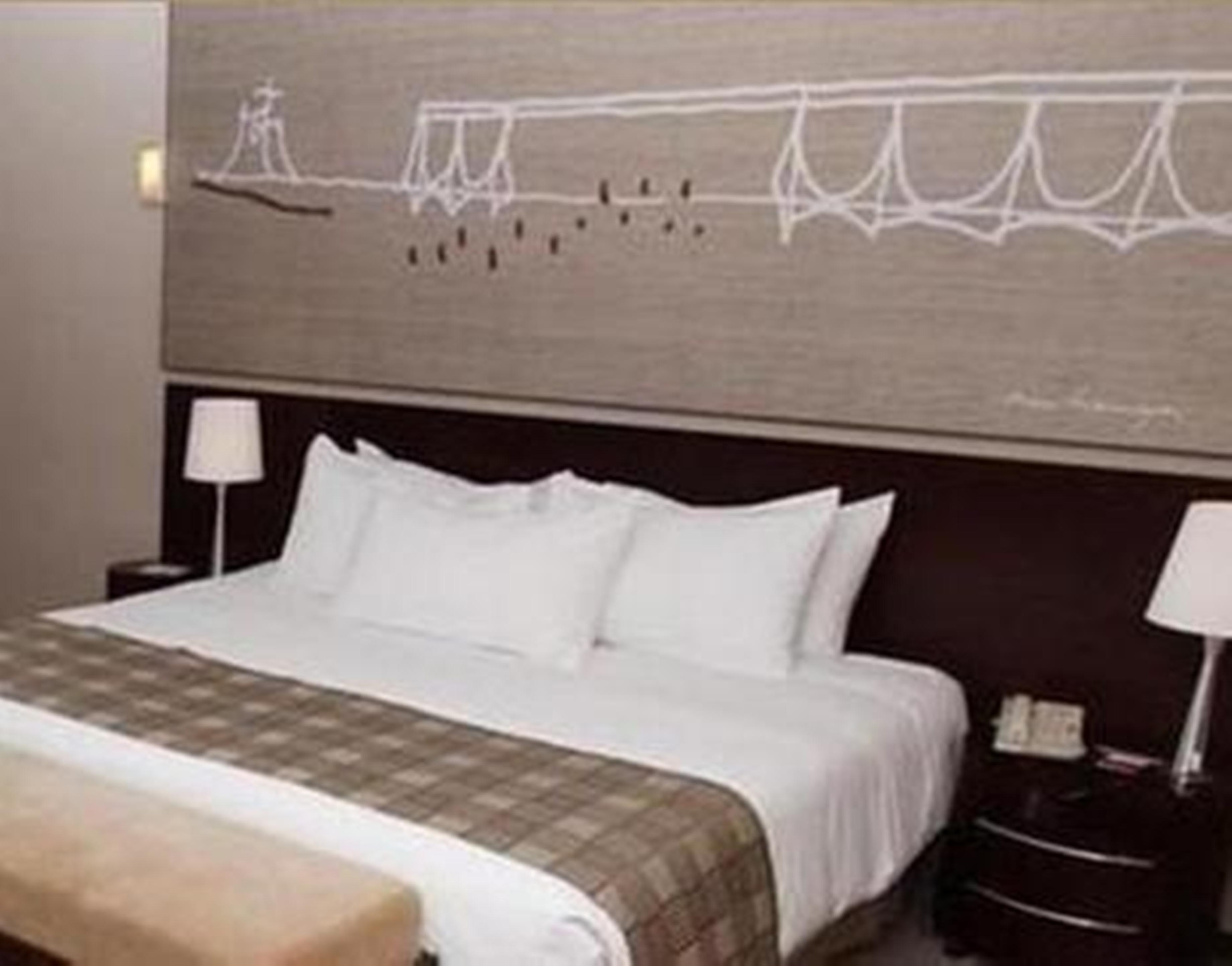 Royal Tulip Brasilia Alvorada Hotel ภายนอก รูปภาพ A bedroom at the hotel